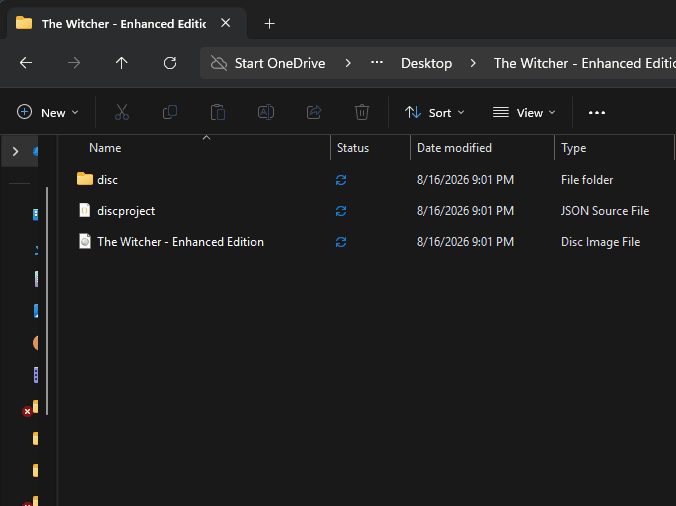 A DiscWright disc mounted in Windows: the drive carries the game's own icon and title in This PC, and double-clicking it opens the menu